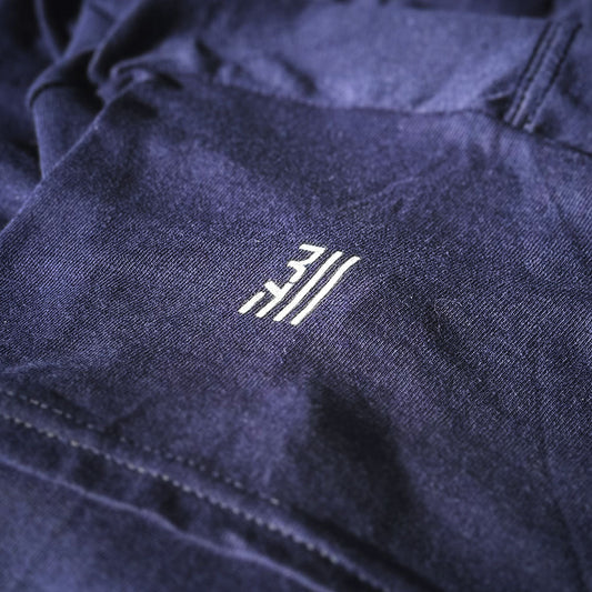 Small talk is a compliance test. • 31 Tabs Classic Tee