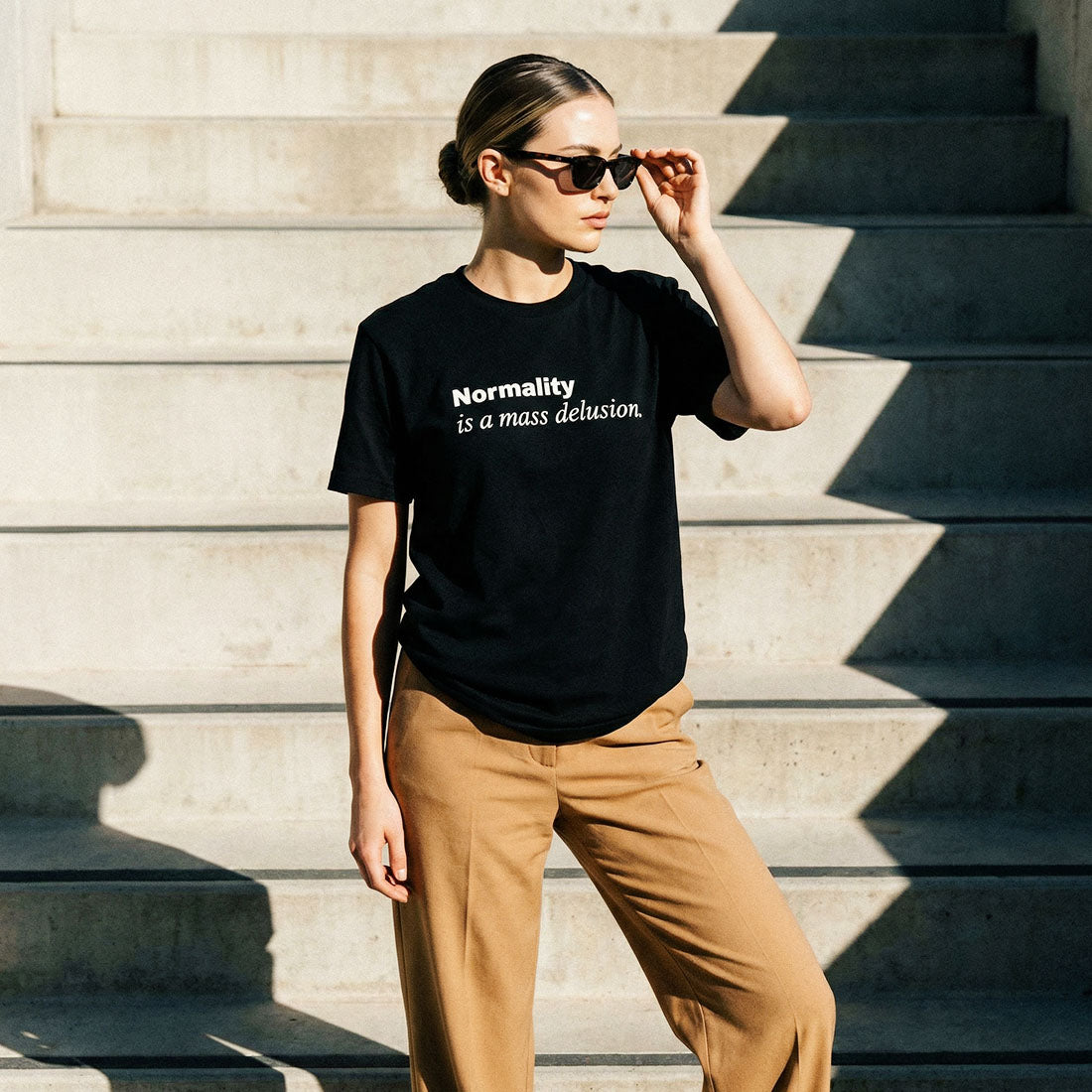 Normality is a mass delusion. • 31 Tabs Classic Tee