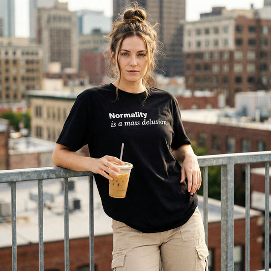Normality is a mass delusion. • 31 Tabs Classic Tee